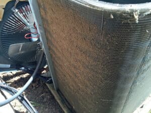 Air Conditioner dirty condenser coil that needs cleaning, Overloaded AC Units.