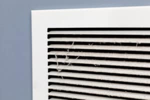 Dirty air vent in house. Household allergies, HVAC duct cleaning, maintenance and house cleaning, HVAC Airflow Optimization.